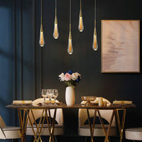Indura crystal small chandelier with gold shimmer for decorative crystal lighting above the dining table